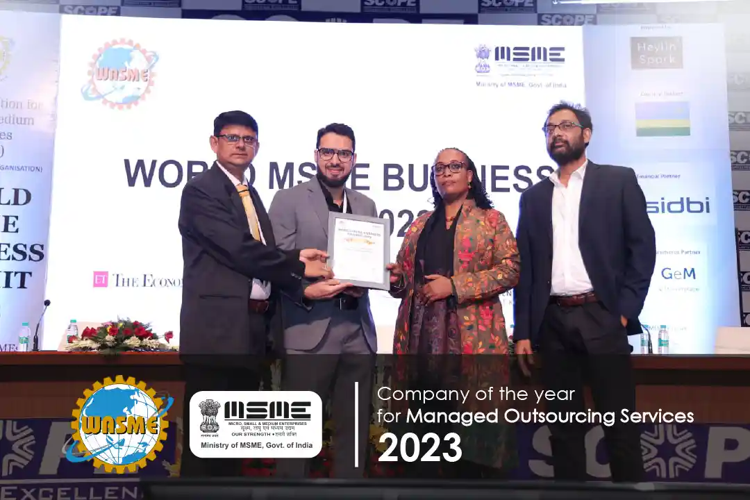 The Outsource Pro receiving the Company of the Year award for Managed Outsourcing Services at the World MSME Business Summit 2023